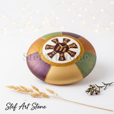 Ръчно лят камък, изобразяващ могъщата Розета от Плиска – един от най-значимите прабългарски артефакти.